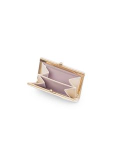 Editor's NotesJ.ESTINA offers sophisticated accessories that exude extravagant feelings. It has a wide range of accessories that are a must-have in your collection.- Softly curved compact-sized card wallet- Made of quilted and wrinkled leather- Gold-tone clasp closure- 2 compartments at the interior- Signature metal hardware at the front- Feminine and stylish moodMeasurements(in.)One Size- Size: 4.13 in. (W) * 3.08 in. (H)Composition & Care- Material: Cow Leather- Natural leather may have fi Chic Rectangular Card Holder, Elegant Card Holder With Interior Slots, Chic Formal Coin Purse With Card Slots, Elegant Card Holder With Card Slots, Chic Compact Coin Purse With Interior Card Slots, Elegant Compact Trifold Wallet For Everyday Use, Elegant Wallets With Interior Card Slots, Elegant Rectangular Wallets With Interior Card Slots, Elegant Beige Coin Purse With Card Slots