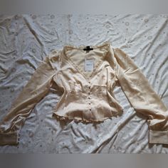 Make An Offer! Cute Button Up Long Sleeve Top In A Cream Color. Silky Material And So Pretty, Nwt. Tags: Long Sleeve, Shirt, Top, Blouse, Satin, Cream, 70s, Buttons, Lace Button-up Tops For Night Out In Spring, Chic Tops With Pearl Buttons For Fall, Chic Fall Tops With Pearl Buttons, Fitted Tops With Pearl Buttons, Chic Button-up Tops With Pearl Buttons, Fitted Cream Top With Buttons, Feminine Fitted Top With Buttons, Spring Button-up Blouse With Pearl Buttons, Feminine Fitted Tops With Buttons