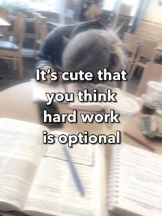 a cat sitting on top of a table next to an open book with the caption it's cute that you think hard work is optimal