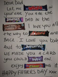 some candy bars are lined up on a white paper with writing in it and the words happy father's day written below them