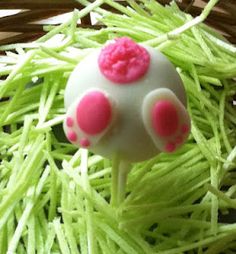 a close up of a mushroom with pink dots on it's eyes and legs