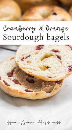 cranberry and orange sourdough bagels are stacked on top of each other