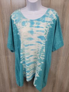 One of a kind, reverse dyed women's shirt, size 1X, but fits like a 2X. Has a swoop neck, is a longer style shirt, and very soft material. All sales are final. Spring Acid Wash Tops, Casual Blue Tops With Natural Dye, Casual Acid Wash Tops With Natural Dye, Oversized Hand Dyed Acid Wash Top, Casual Hand Dyed Oversized Tops, Oversized Soft-washed Tie Dye Top, Blue Tops With Natural Dye, Bohemian Hand Dyed Relaxed Fit Tops, Tie Dye Crew Neck Top With Natural Dye