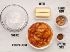 ingredients to make apple pie laid out in bowls