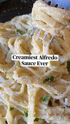 a close up of a pasta dish with the words creamiest alfredo sauce ever on it