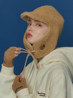 Editor's NotesCPGN’s trooper hat gives casual look with comfortable fit and earflap detail.- Comfortable fit- Earflaps with drawstring and Comme drawing embroidery wappen- Soft fabricMeasurements(in.)One Size- Circumference: 22.4in.- Height: 7.1in.- Brim: 1.6in.*Model Info: 5’8’’Composition & Care- 100% Polyester- Hand-wash in lukewarm water using a neutral detergent recommendedDesigner- by CPGN Casual Winter Bonnet With Ear Flaps, Casual Adjustable Bonnet With Ear Flaps, Casual Warm Bonnet With Ear Flaps, Winter Outdoor Bonnet With Ear Flaps, Casual Windproof Hat With Ear Flaps, Casual Winter Hat With Ear Flaps, Khaki Winter Hats, Adjustable Bonnet For Outdoor Fall Wear, Brown Hats With Ear Flaps For Outdoors