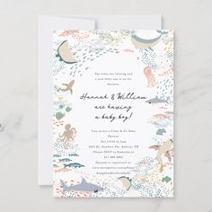 an ocean themed wedding card with octopus, squid and jellyfish on the bottom right corner