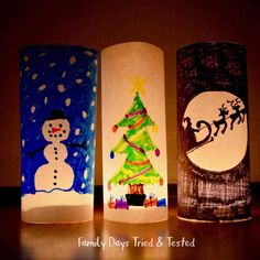 three paper tubes decorated with christmas images