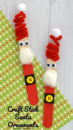 craft stick santa ornament made with yarn and buttons