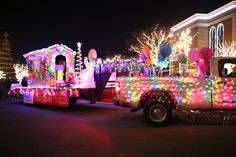 a truck is decorated with christmas lights and decorations