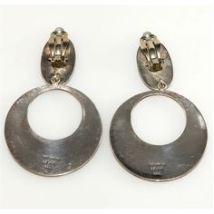 This is part of Chairish’s Costume Jewelry assortment.  Not your average abalone! Dangling high quality hoop earrings crafted of fine sterling silver with beautiful abalone shell inlay featuring birds and flowers. Marked Mexico TF32 .925. Mark indicates they were made in Taxco, likely made by German Fuentes Flores (of the Margot de Taxco related Fuentes family) according to "The Little Book of Mexican Silver Trade and Hallmarks" (Third Edition) by Bille Hougart. Measure about 3 inches long and j Sterling Silver Round Clip-on Jewelry, Sterling Silver Clip-on Hoop Earrings, Mexican Silver Jewelry, Birds And Flowers, Round Rock, Earring Crafts, Accessories Jewelry Earrings, Abalone Shell, Gold Plated Earrings