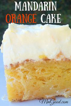 a close up of a piece of cake on a plate with the words mandarin orange cake