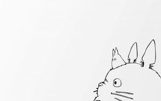 a black and white drawing of a totoro