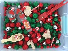 a box filled with christmas decorations and cookie cutters