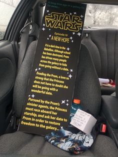 a star wars book sitting in the back seat of a car