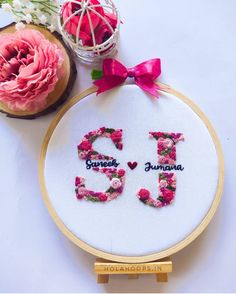 a cross - stitch pattern with the word's 30th birthday written in floral letters