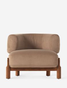 a tan couch with wooden legs on a white background and no one in the room