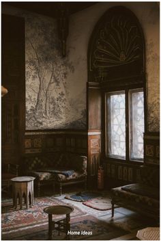 an ornately decorated living room with large windows