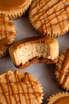 peanut butter cupcakes with chocolate drizzled on top