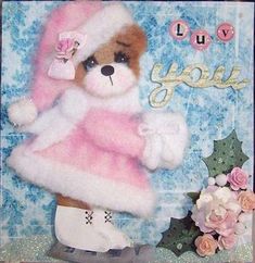 a card with a teddy bear dressed in pink and white