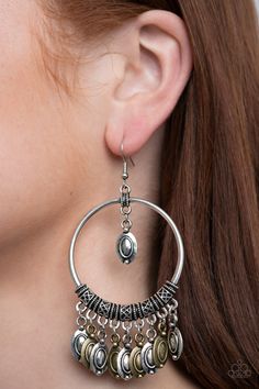 Decorative silver and brass beads swing from the top and bottom of an ornate silver hoop, creating a tribal inspired fringe. Earring attaches to a standard fishhook fitting.

 Sold as one pair of earrings. Multi Earrings, Paparazzi Jewelry Images, Paparazzi Accessories Jewelry, Fringe Earring, Brass Beads, Silver Frames, Paparazzi Accessories, Chic Jewelry, Paparazzi Jewelry