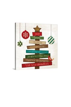 a christmas card with a tree made out of books