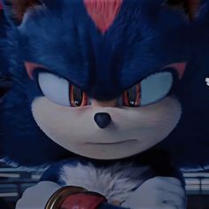 sonic the hedgehog from sonic the hedgehog is looking at something with big eyes