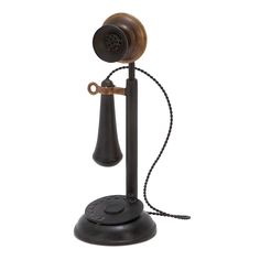 an old fashioned telephone is shown with a cord attached to the phone's base