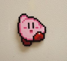 an image of a pixel art piece on the wall