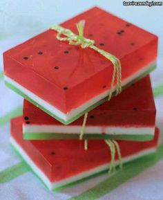 three watermelon soaps tied with twine and sitting on top of each other