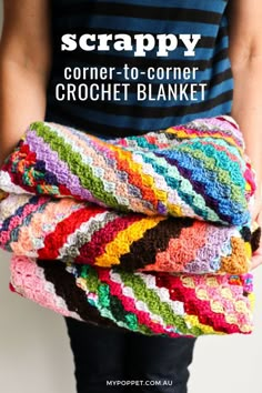 a woman holding two crochet blankets with the text, scrappy corner to corner crochet blanket