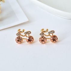 Cycolinks Golden Crystal Stud Bicycle Earrings - Cycolinks Trendy Alloy Crystal Earrings, Gold Alloy Crystal Earrings For Pierced Ears, Gold Alloy Crystal Earrings, Alloy Drop Clip-on Earrings As Gift, Gift Drop Clip-on Earrings Made Of Alloy, Trendy Gold Metal Crystal Earrings, Rose Gold Crystal Earrings For Gift, Rose Gold Crystal Earrings, Gold Alloy Clip-on Earrings As Gift