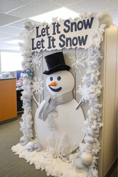 A cheerful snowman is a delightful addition to your cubicle Christmas decorations. Imagine building a foam snowman with a cozy scarf and festive hat right on your cubicle wall—it’s fun and full of personality. What accessories would you add to make it stand out even more? Christmas Decorations For Work Cubicle, Call Center Christmas Decorations, White Christmas Office Decorating Ideas, Office Snowman Decorations, Desk Decorating Ideas Work Christmas, Snowman Office Decorations, Work Holiday Decorations, Cubicle Winter Wonderland, Desk Decor Ideas Christmas