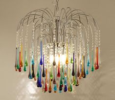 a multicolored chandelier hanging from the ceiling