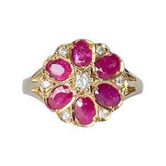 This stunner holds 6 rubies and 7 diamonds. The rubies are a bright, rich pink tone and the diamonds are so bright and sparkly. The diamonds total 20pts and the rubies total 1.2carats. The ring is modelled in 9carat gold. Ring Size: M 1/2 or 6 1/2 Cluster Diameter: 13mm Height From Ring: 5.5mm Weight: 3.2g Ruby And Pearl, Pearl Cluster Ring, Pink Ruby, Pearl Cluster, Ruby Diamond, Pink Tone, Ruby Ring, Cluster Ring, Gold Ring