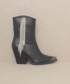 The Kai Rhinestone Fringe Boots are an exquisite combination of glamour and ruggedness. With an etched toe cap and rhinestone fringe, this boot has all the style and durability you need. A convenient zipper closure makes them easy to slip on and off. Style: Western Silhouette: Boot Embellishment: Rhinestone Length: Ankle Closure: Zipper Heel Height: 3.5" Width: Regular Imported Western Rhinestone Fringe Boots For Fall, Western Boots With Rhinestone Fringe For Fall, Western Party Boots With Fringe, Western Boots With Rhinestone Fringe And Round Toe, Leather Party Boots With Rhinestone Fringe, Party Leather Boots With Rhinestone Fringe, Winter Boots With Rhinestone Fringe, Glamorous Boots With Rhinestone Fringe And Round Toe, Glamorous Winter Boots With Rhinestone Fringe