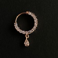 Name of Product: Bridal Traditional Jewelry Indian Antique Nose Ring. It requires a hole in the nose ( piercing is required ) Color: Rose Gold Material: Copper Unfortunately no exchanges /refunds due to hygiene reasons Diameter: 1 / 1.8 Centimeter Shipping processing time: 1-3 days Delivery time: depend on countries To view our latest collection of Nose rings / Nath please click the below link. https://www.etsy.com/uk/shop/HemrajJewellers?ref=seller-platform-mcnav&section_id=30100702 Jewelry Wedding Diamond Nose Ring With Prong Setting, Rose Gold Body Jewelry For Wedding, Elegant Diamond Septum Ring For Wedding, Wedding Hoop Septum Ring, Elegant Rose Gold Septum Ring For Wedding, Cubic Zirconia Nose Rings With Prong Setting For Wedding, Gold Cubic Zirconia Nose Rings For Wedding, Wedding Nose Rings With Cubic Zirconia Prong Setting, Gold Cubic Zirconia Wedding Nose Ring