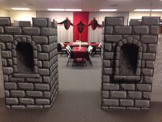 an image of a castle made out of bricks in the middle of a meeting room