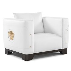 a white chair with a lion head on it's armrests and legs