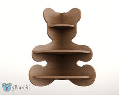 a wooden shelf with three shelves in the shape of an animal's head on it