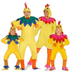 three children in chicken costumes standing next to each other