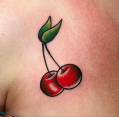 two cherries tattoo on the chest