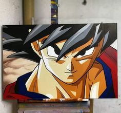 an easel with a painting of gohan on it