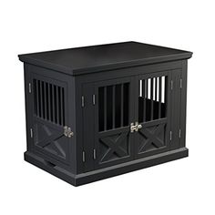 a black dog crate sitting on top of a white floor