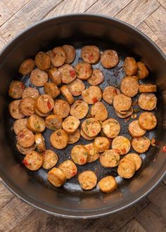 the food is being cooked in the pan on the table