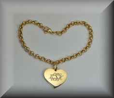 "This personalized gold heart charm bracelet is the perfect engraved gift! These custom engraved charm bracelets make great gifts for bridesmaids or for that special someone. Upon purchase you can send the text you would like engraved along with the font style in a message. If the engraving is too long or needs to be revised in any way, you will be contacted in a reply message with the revision that is required. You can also send a message prior to purchase to discuss the engraving you would lik Gifts For Bridesmaids, Engraved Gifts, Engraved Items, Font Style, Font Styles, Gold Heart, Heart Charm Bracelet, Heart Of Gold, Charm Bracelets