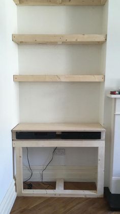 an entertainment center made out of pallet wood