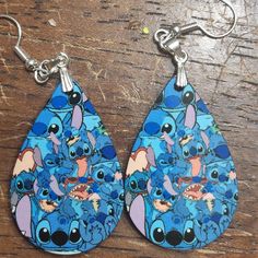 Handcrafted Apprx. 2in In Total Length Fun Handmade Blue Jewelry, Fun Blue Dangle Jewelry, Blue Fun Dangle Jewelry, Blue Dangle Jewelry With A Fun Style, Blue Fun Drop Earrings, Trendy Blue Teardrop Jewelry, Blue Drop Earrings Fun Style, Stitch Collage, Nerdy Glasses