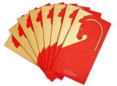 six red and gold cards with an image of a woman's head on them