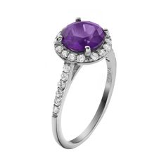 Decorated with purple and white cubic zirconia stones, this halo ring offers understated elegance. Comes in a gift box. Click on this JEWELRY & WATCHES GUIDE to learn about fit, styles, materials and more!RING DETAILS Width: .43 in. Metal: rhodium-plated sterling silver CUBIC ZIRCONIA DETAILS Cut: round Color: purple, white Setting: prong  Size: 9. Gender: female. Age Group: adult. Formal Purple Cubic Zirconia Diamond Ring, Classic Purple Diamond Promise Ring, Elegant Purple Cluster Ring For Formal Occasions, Purple Brilliant Cut Diamond Ring For Formal Occasions, Elegant Purple Cluster Ring For Anniversary, Formal Purple Diamond Ring With Brilliant Cut, Formal Purple Cubic Zirconia Birthstone Ring, Purple Cubic Zirconia Birthstone Ring, Amethyst Ring With Brilliant Cut Cubic Zirconia